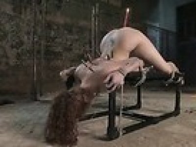 Busty redhead gets her pussy clipped and fucked in bdsm extreme sex scenes