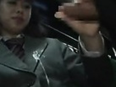 Schoolgirl gives handjob on a bus