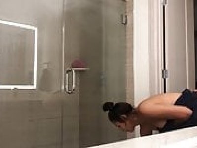 Hot latina undresses and showers