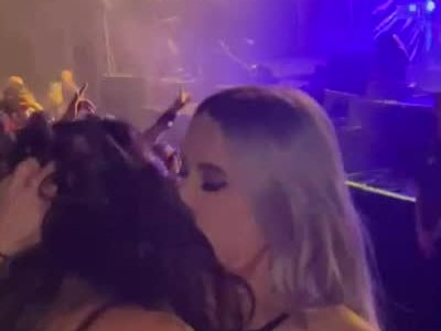 girls sucking titties at a concert