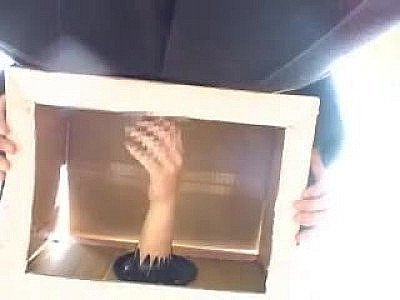 Japanese girls touch his dick in a box