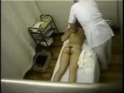 Naked massage caught on voyeur cam