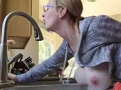 Big breasted wife fucked in the kitchen while cooking lunch