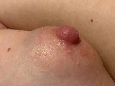Cumshot on Her Nipples