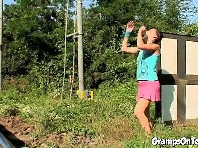 Teen rides oldie by the roadside