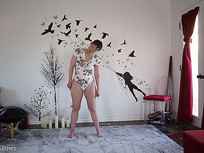 Goddess Aurora Willows Stretching in Sexy Bodysuit